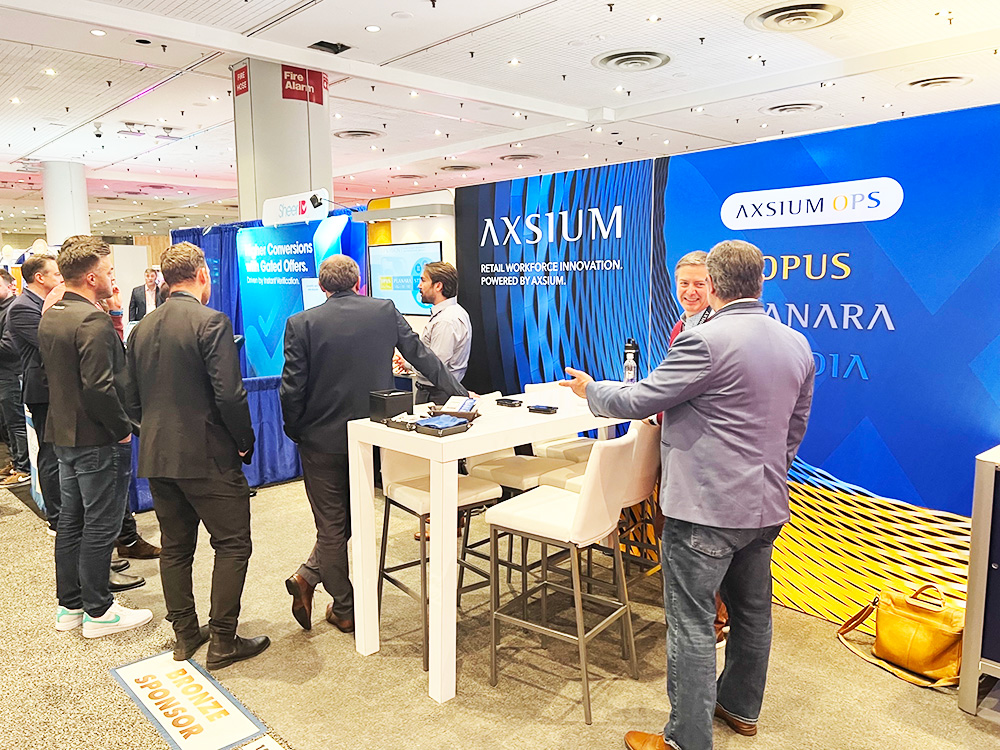 NRF 2023 attendees get a hands-on demo of Axsium OPS, featuring Opus, Planara, and Studia.