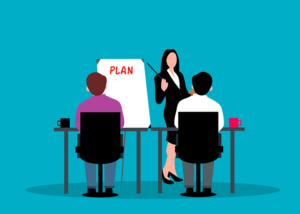 illustration of woman presenting plan to team members