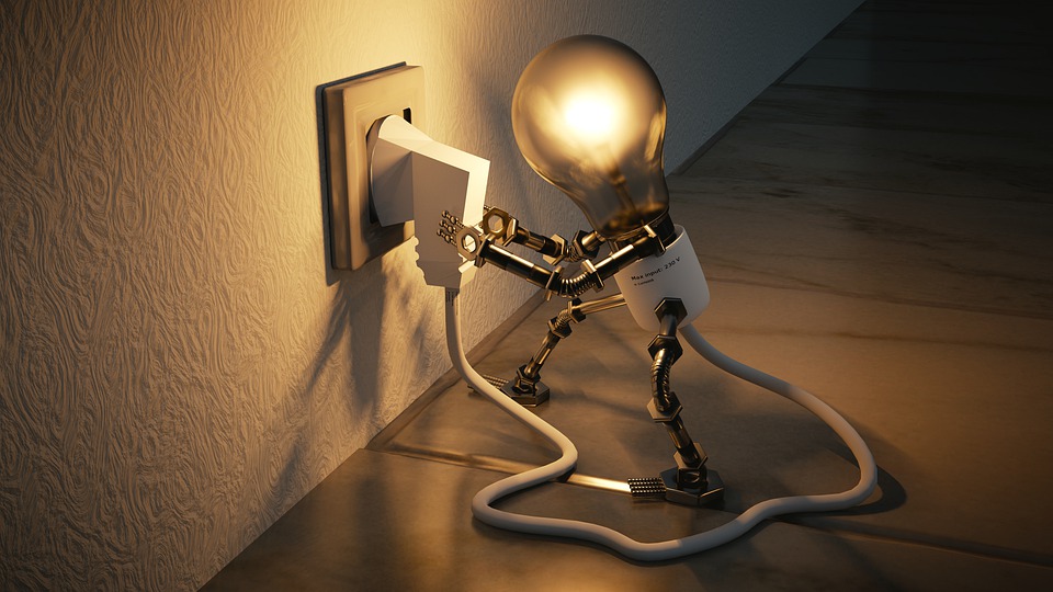 image of lightbulb figure plugging itself in