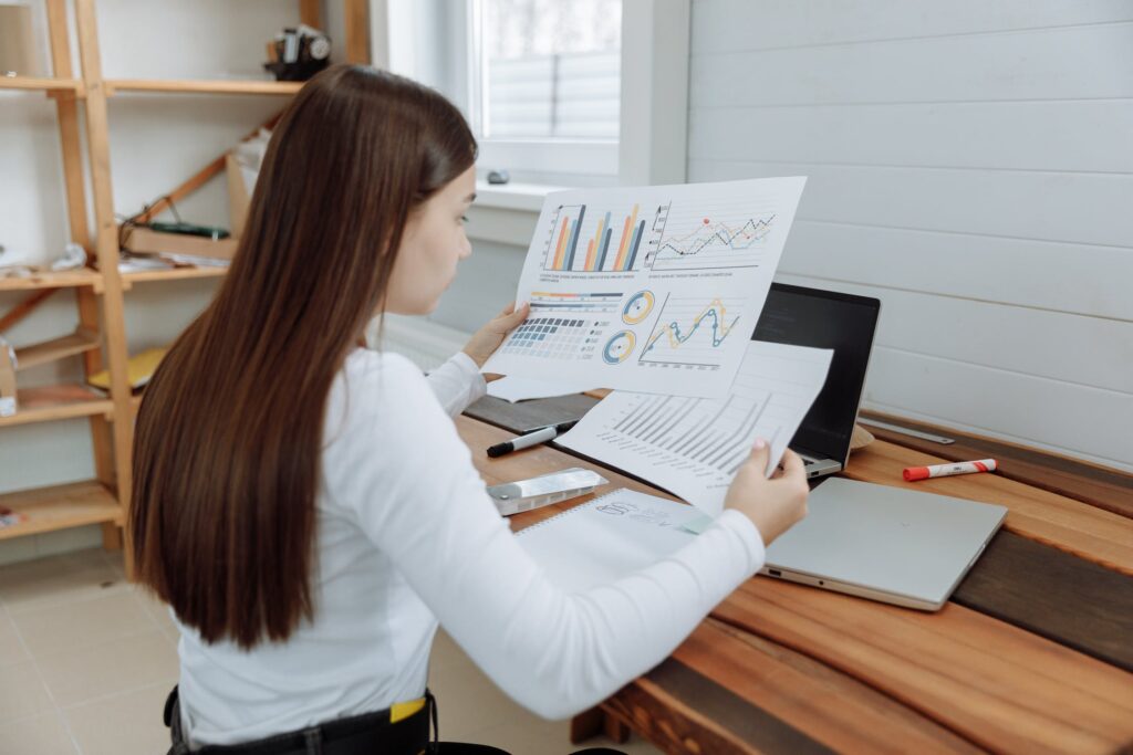 woman reviewing charts